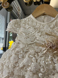 Karol Baptism Dress in Champagne (FINAL SALE DRESS HAS IMPERFECTION SEE DESCRIPTION/ VENTA FINAL MODELO CON IMPERFECCION LEER DESCRIPCION